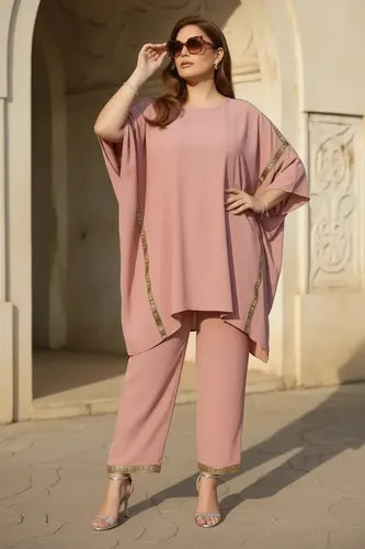 Mono rosa tipo blusón manga murciélago