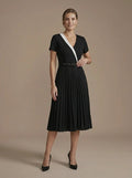 Vestido midi negro plisado cintura alta de fiesta