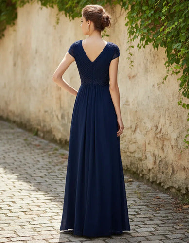 Vestido largo azul de gasa escote V corte princesa