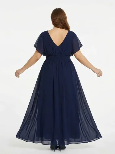 Vestido largo de fiesta evasé en gasa con manga corta