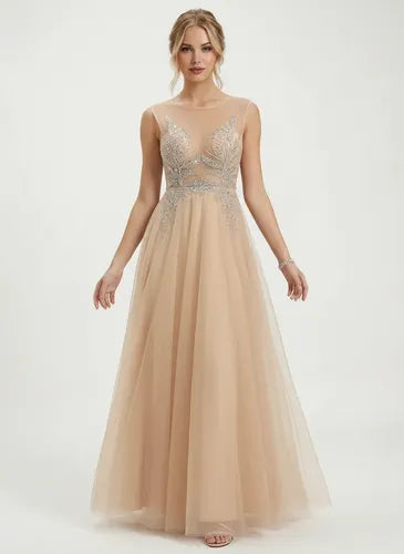 Vestido largo de fiesta beige en tul con transparencia