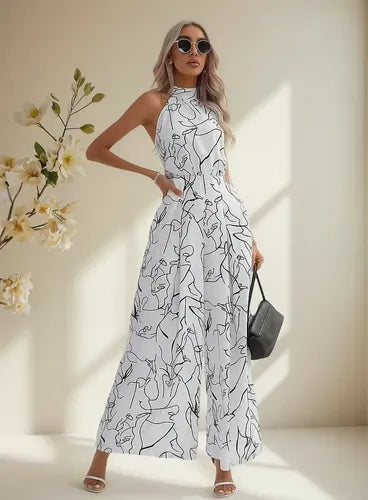 Mono de una pieza estampado blanco y negro con escote halter y bolsillos para fiesta