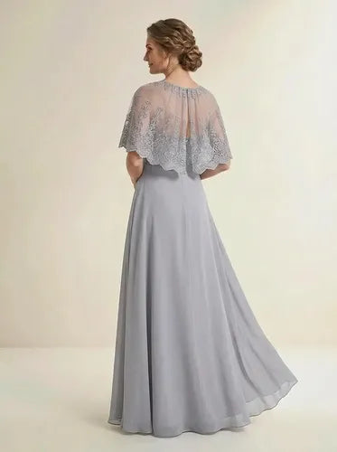 Vestido largo gris con capa corta cuello redondo