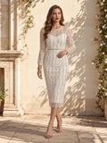 Vestido midi blanco y negro evasé manga larga