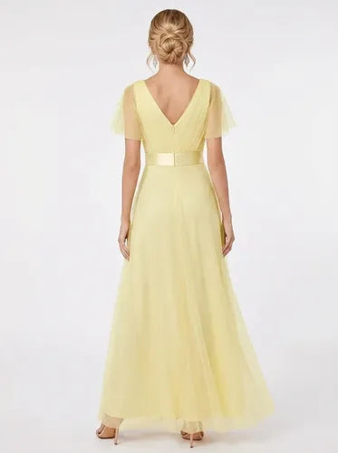 Vestido largo amarillo de tul corte imperio