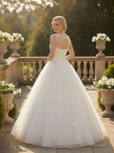 Vestido de novia corte princesa de tul cuello cubierto