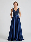 Vestido largo lentejuelas azul escote V satén
