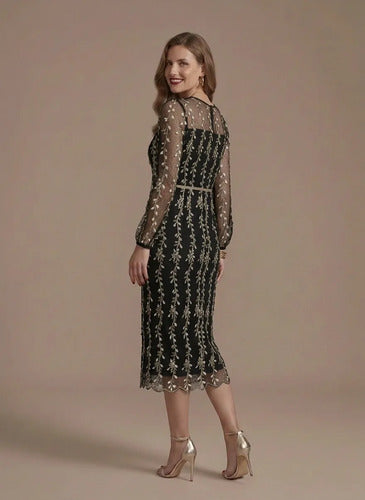 Vestido midi blanco y negro evasé manga larga