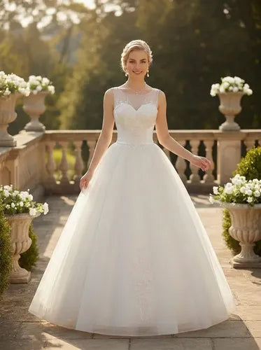 Vestido de novia corte princesa de tul cuello cubierto