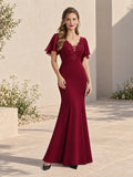 Vestido largo bordó sirena escote V elegante